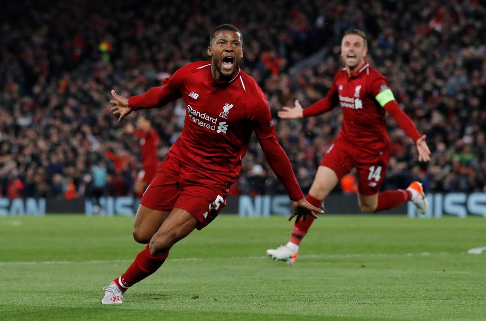 Wijnaldum wheels away in delight after nodding in his second to level the scores 