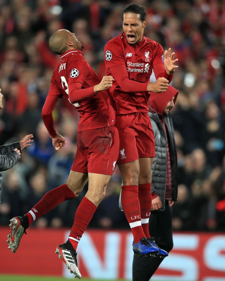  Fabinho chest-bumps Virgil Van Dijk after Liverpool complete their stunning victory