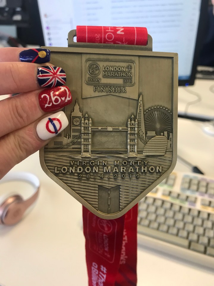  I took my medal and finisher t-shirt into work the Monday after the marathon