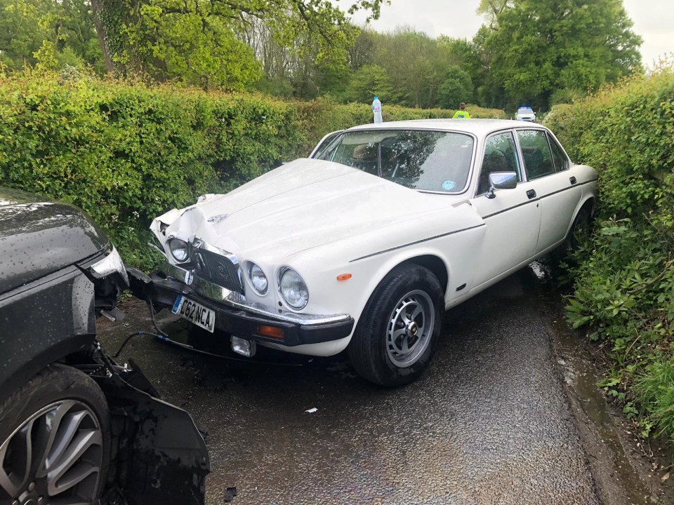  The mangled white Jaguar and Nigel Farage's Range Rover after the head-on smash