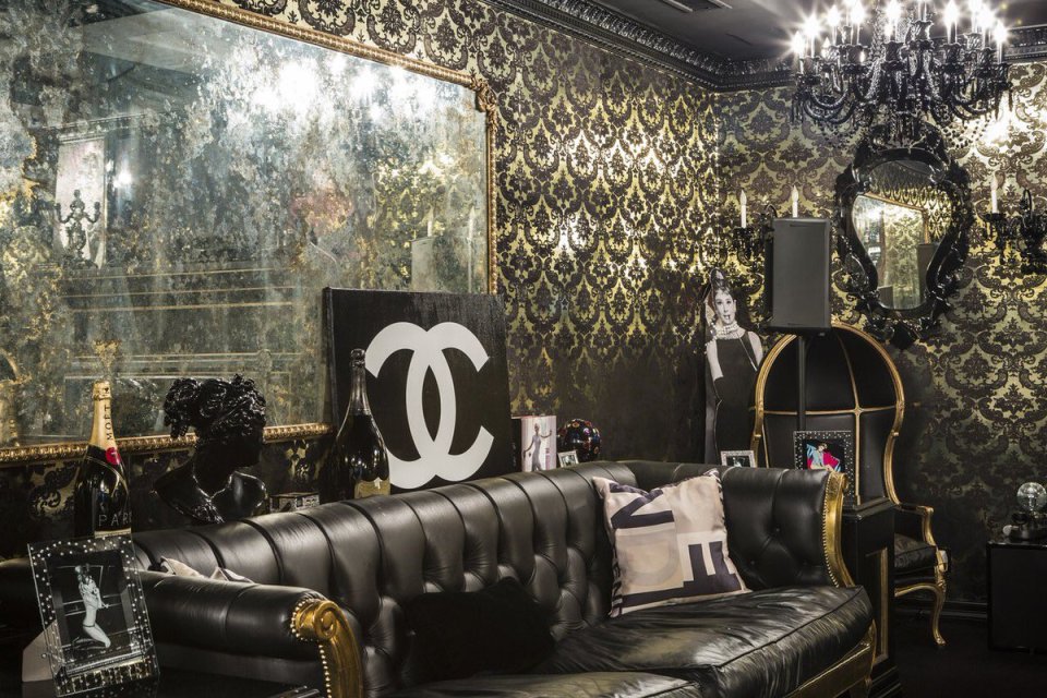  Forget a bar, Paris Hilton has her own nightclub complete with huge bottles of Moet