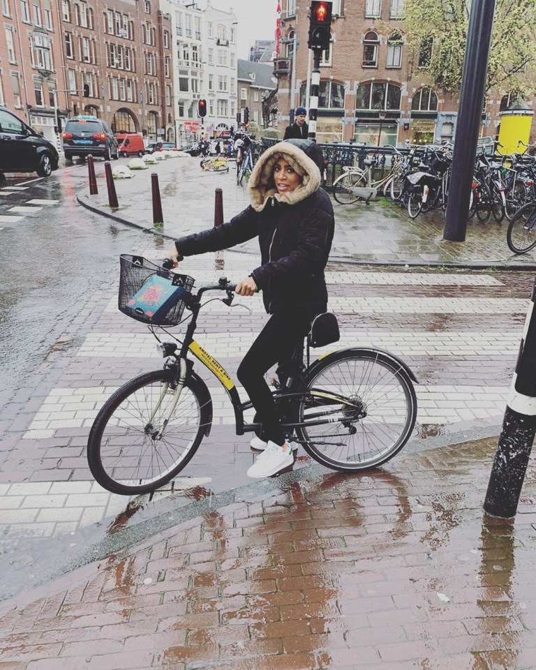  Tisha shared a snap of her riding a bike around town