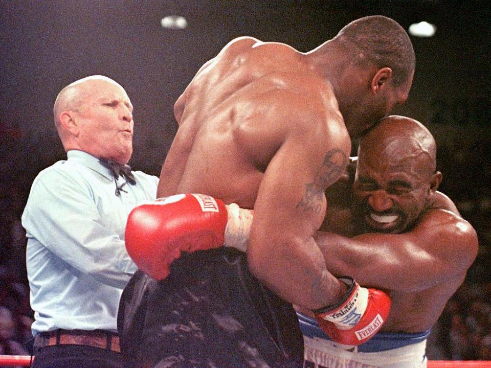  Tyson shocked the world when he bit off Evander Holyfields's ear