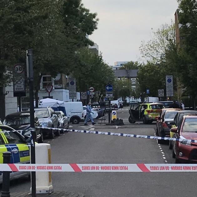 A body was found in a wheelie bin behind the Waitrose store in Islington at 4pm on Saturday