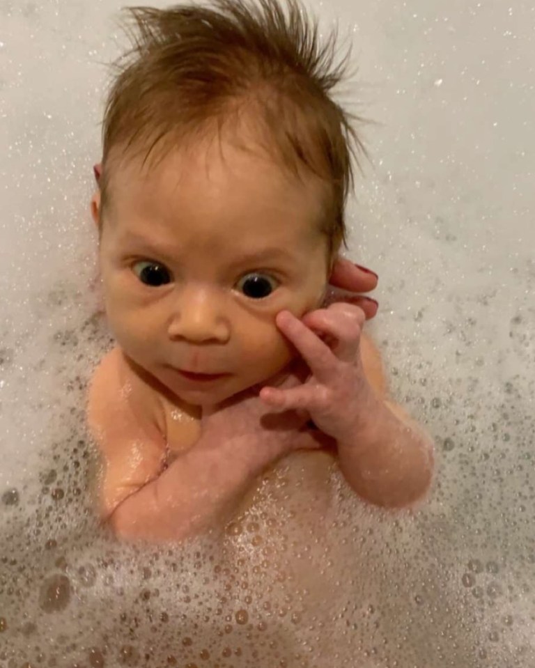 Little Oscar was shown enjoying a bubble bath