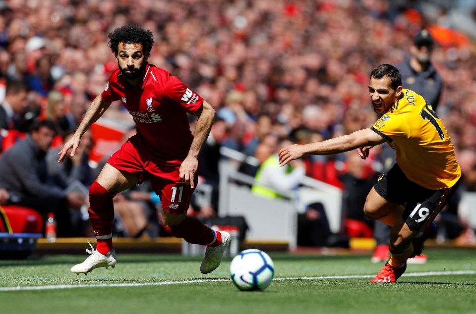  Mo Salah races in behind the Wolves defence at Anfield