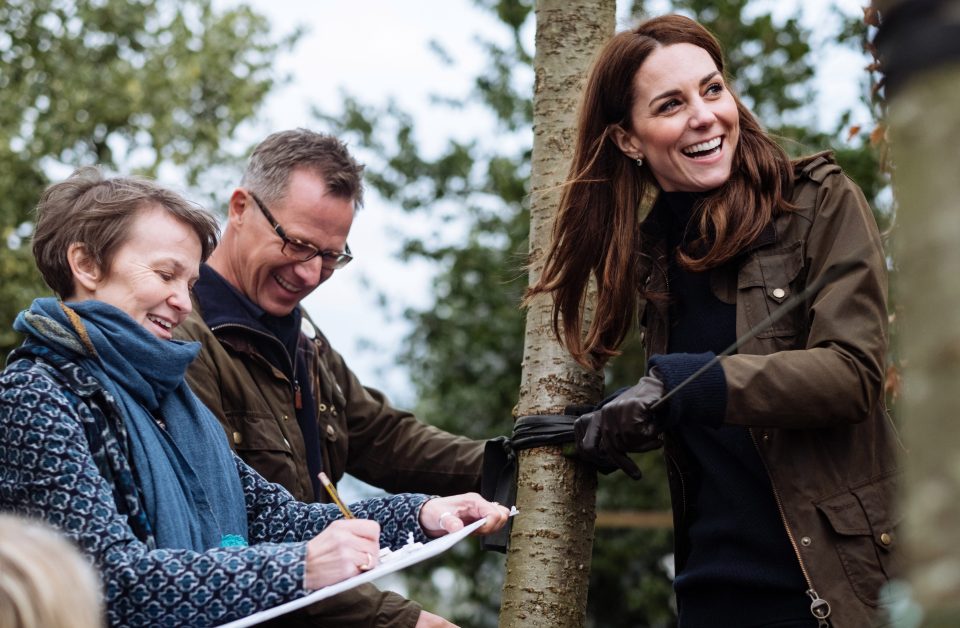  The palace has released three new pictures of Kate Middleton working on her garden at Chelsea Flower Show earlier this month