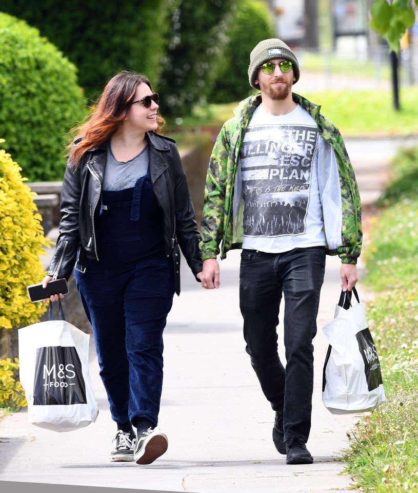  The pair looked loved up as they strolled back to their South London home with M&S shopping bags