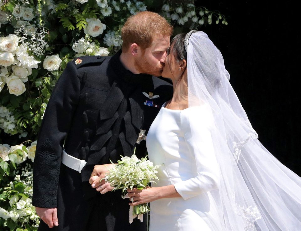  Harry and Meghan on their wedding day last year