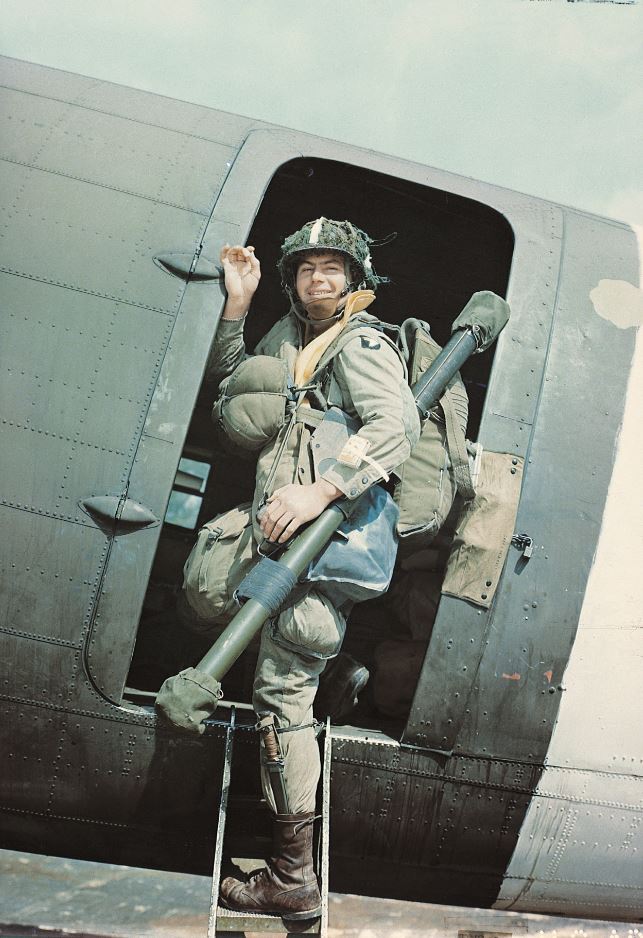  Laden with equipment and his parachute, a soldier of the 101st Airborne Division armed with a ‘Bazooka’