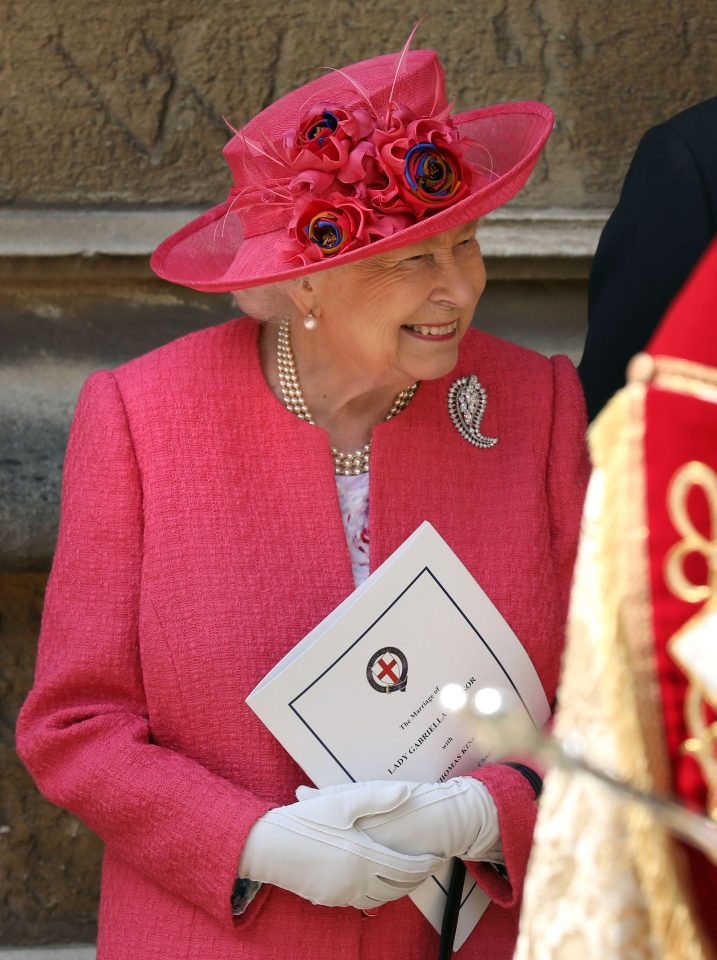 The 93-year-old monarch appeared in good spirits for the wedding