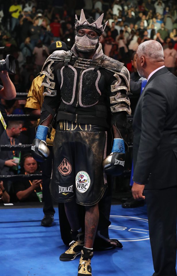  Deontay Wilder wears a mask as he enters the ring to fight Dominic Breazeale