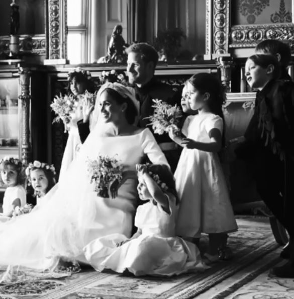  Harry and Meghan with Princess Charlotte, Prince George and other bridesmaid and page boys