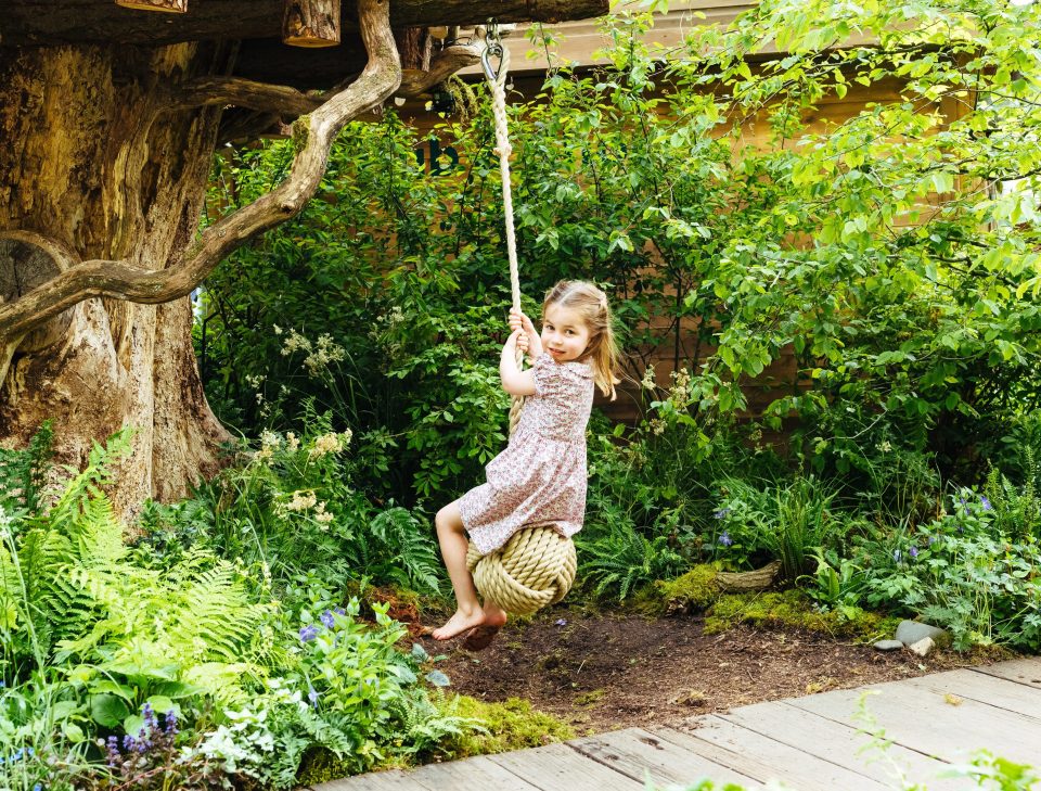  Princess Charlotte was previously pictured swinging in the Back to Nature garden