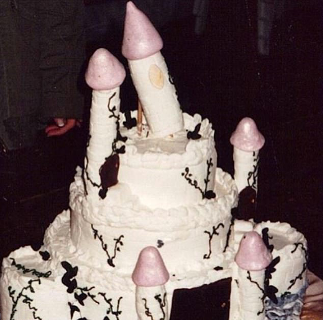  This rather phallic-looking cake looks like it is about to tip over