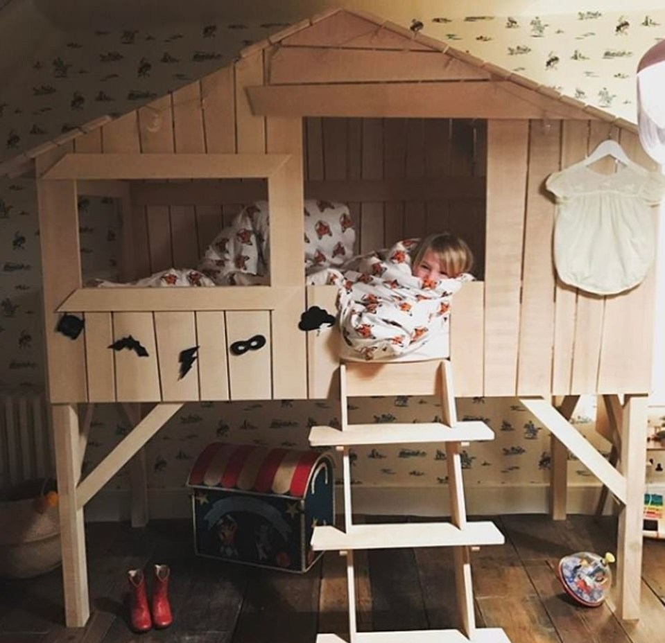  An indoor treehouse-themed bed in one of the kids' bedrooms