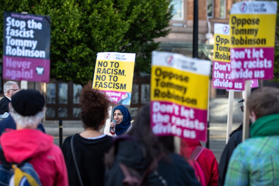  Anti-racism protesters chanted outside the counting hall before Robinson's arrival