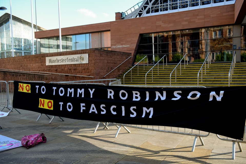  Anti-Robinson protesters set up outside the convention centre