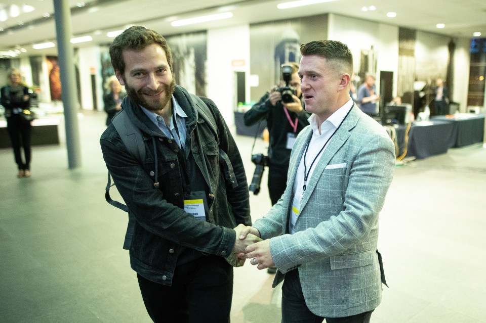  Robinson, real name Stephen Yaxley-Lennon, with his election agent Eitan Gilboord in Manchester