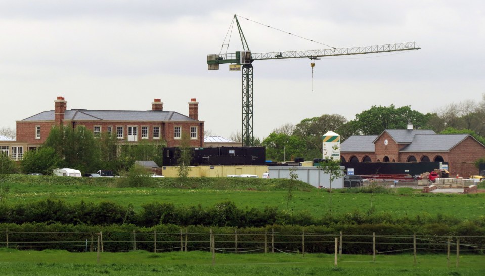  Crews of builders with cranes are working on the £20million property