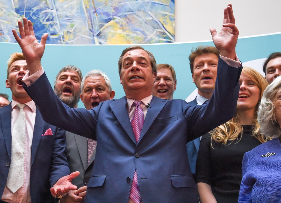  Jubilant Nigel Farage celebrates with MEPs after he gave the Tories and Labour an EU election hammering