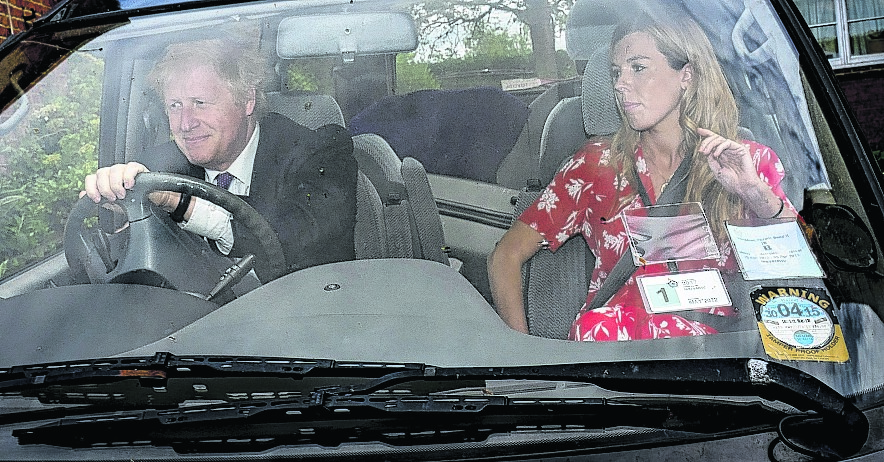  Boris Johnson and his girlfriend Carrie Symmonds leave his Oxfordshire home on Monday