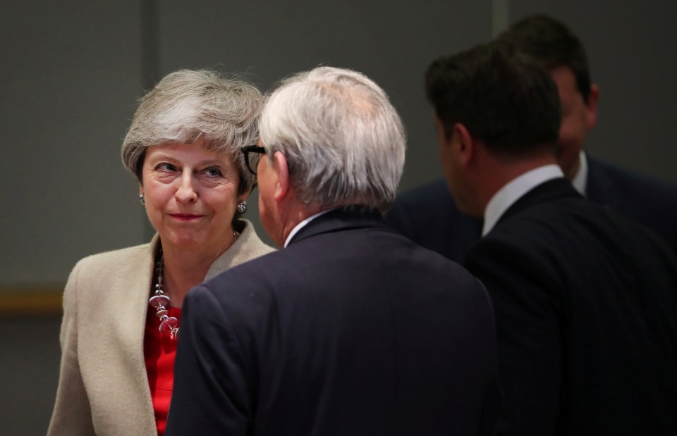  Mrs May talking to EU boss Jean-Claude Juncker