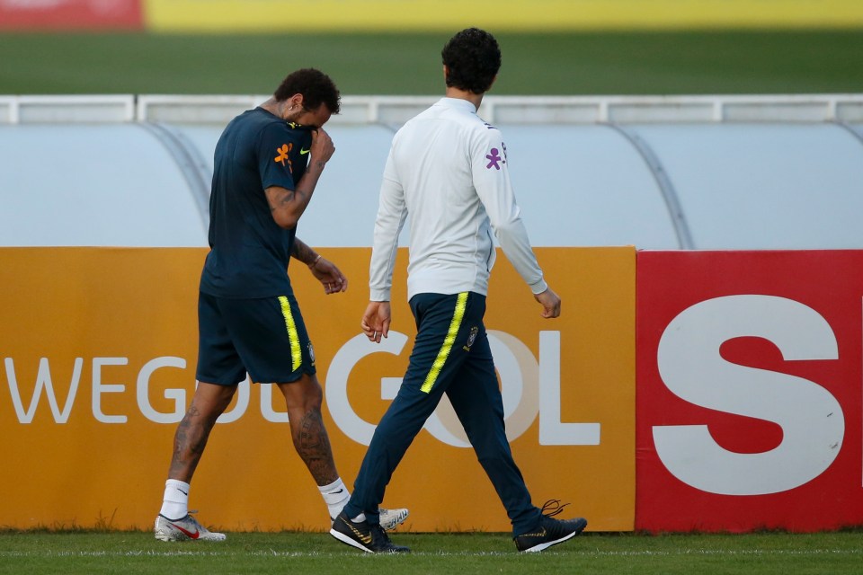  The world record man was walked off the training pitch by medical staff