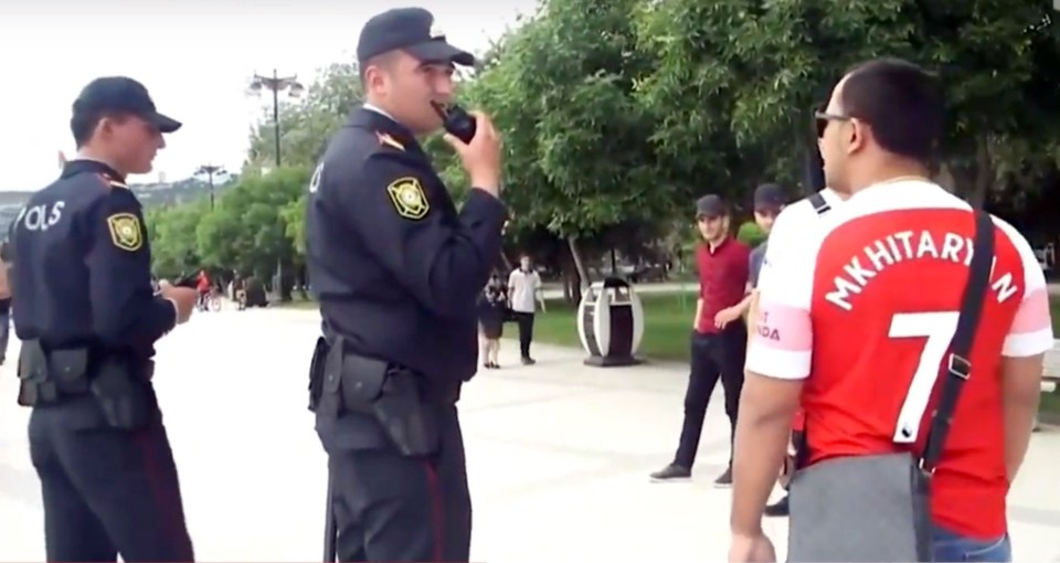  Police in Baku have been stopping Arsenal fans wearing Mkhitaryan shirts