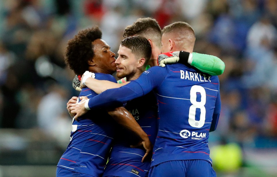  Mateo Kovacic is mobbed by Ross Barkley and Willian after winning the Europa League