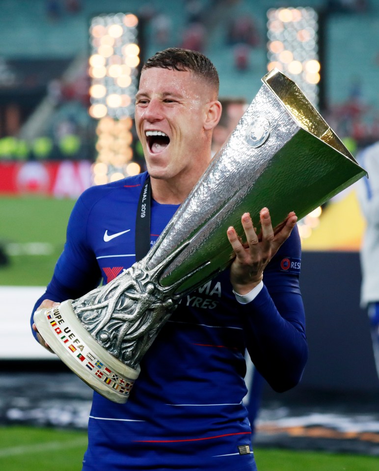  Barkley lifts the Europa League trophy following Chelsea's 4-1 triumph over Arsenal