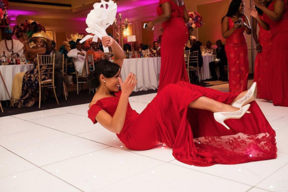  One bridesmaid beamed as she grabbed the flowers while falling on the floor