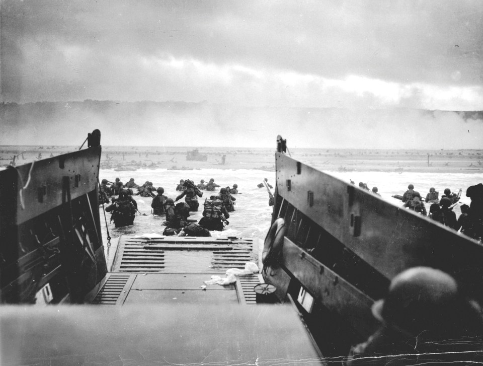  The Coast Guard LCI(L)-85, battered by enemy fire after approaching Omaha Beach, prepares to evacuate the troops to the U.S.S. Samuel Chase, June 1944