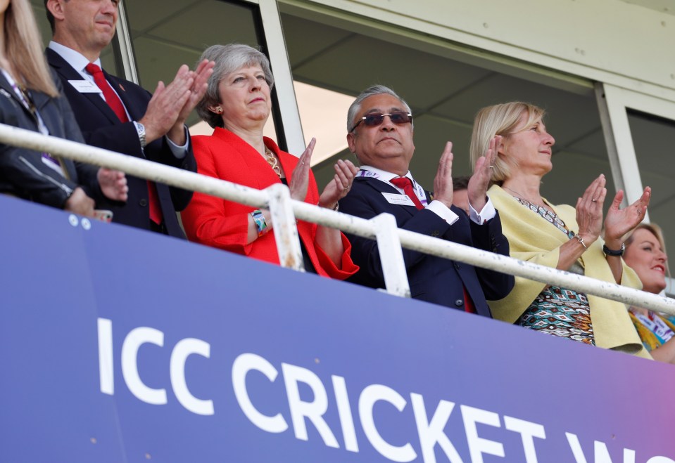  Theresa May watching the cricket this morning