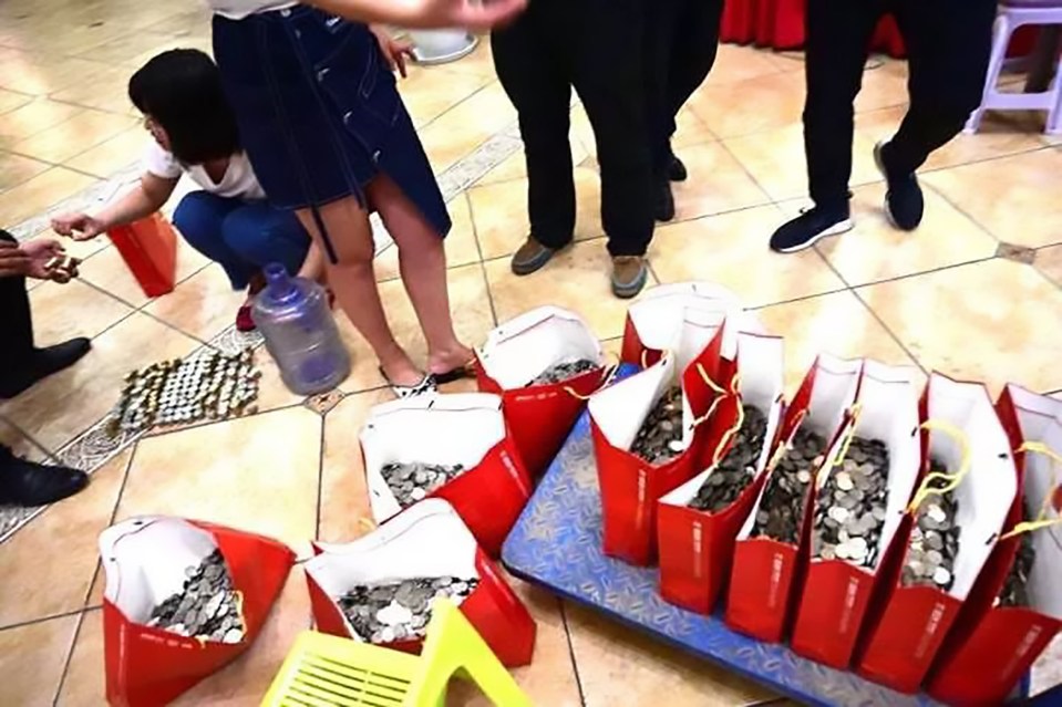  The coins were sorted into bags, each containing roughly £230