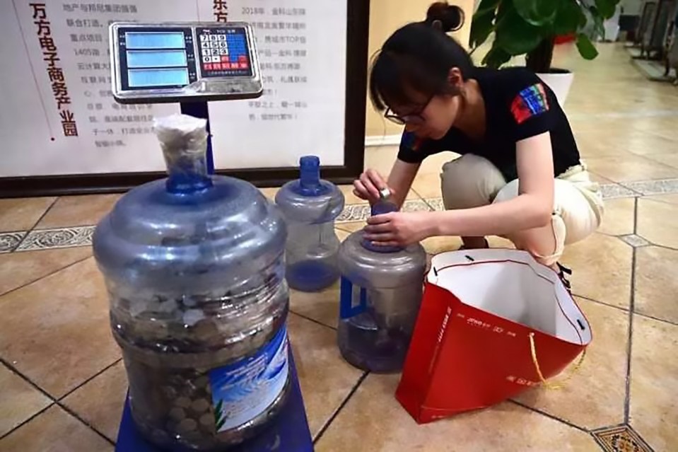  The unnamed home buyer brought the coins to the bank in water bottles