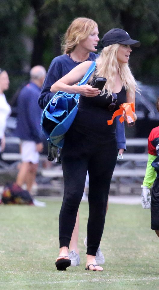  Elin was dressed all in black, with a matching cap, at the recent flag football game