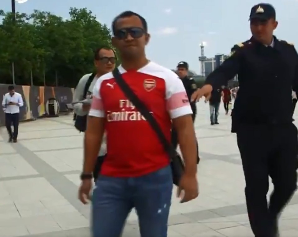  Two Arsenal fans were stopped by police for wearing Henrikh Mkhitaryan shirts in Baku