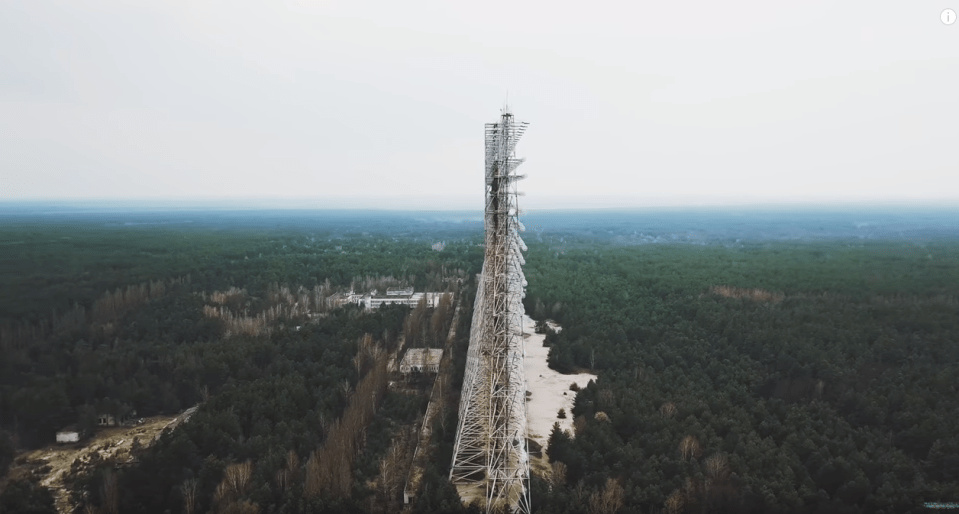  An enormous metal structure looms onto the deserted city