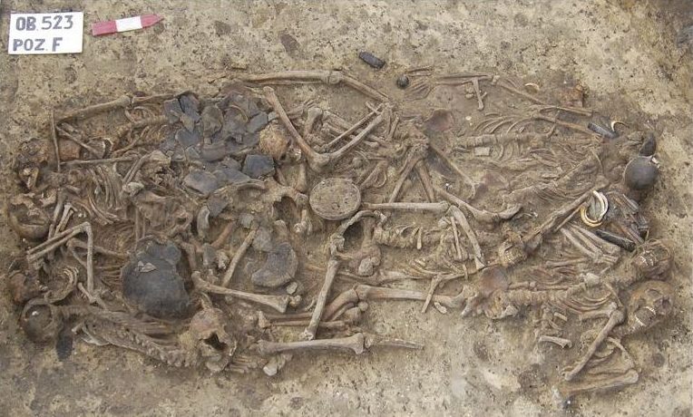  Mothers and children have been buried next to each other in the mass grave