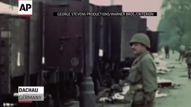  A solider stands at the station at the Dachau concentration camp