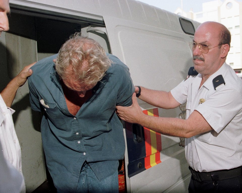  Shackled Noye is led towards cells after a dramatic arrest in Spain, 1998