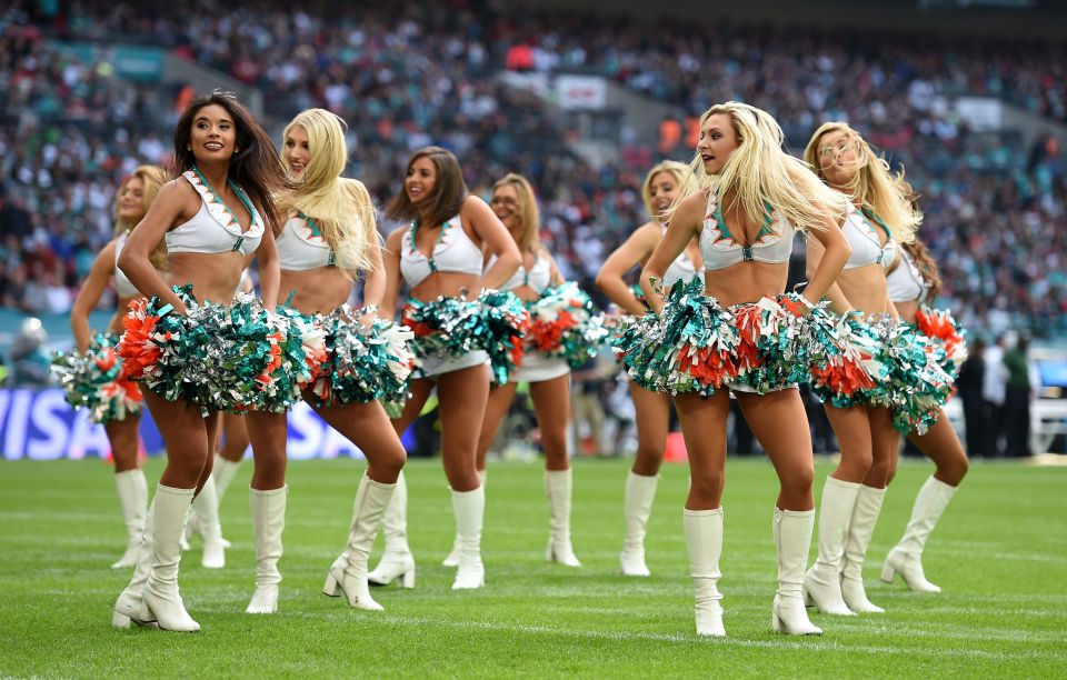  Miami Dolphins cheerleaders entertain the crowd during an NFL game