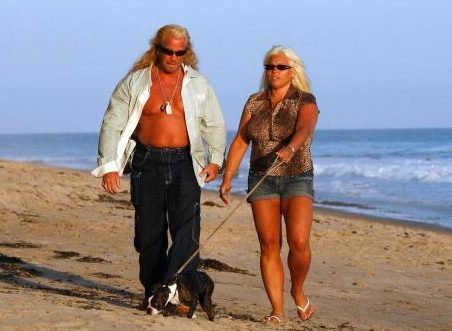  Dog and Beth walk on the beach near their Hawaii home in 2008