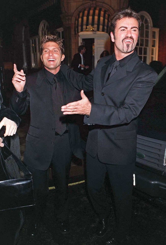 George Michael with partner Kenny Goss at Elle MacPherson’s 30th birthday party at Harry’s Bar in London in  1999