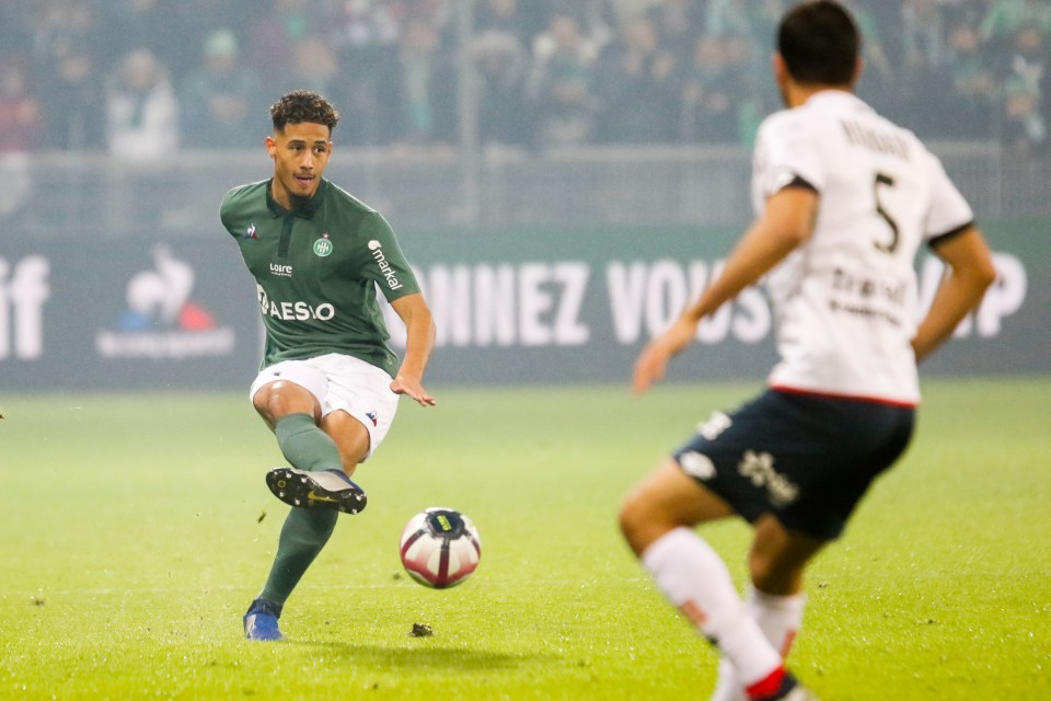  William Saliba plays a through ball during the Ligue 1 match between Saint Etienne and Dijon