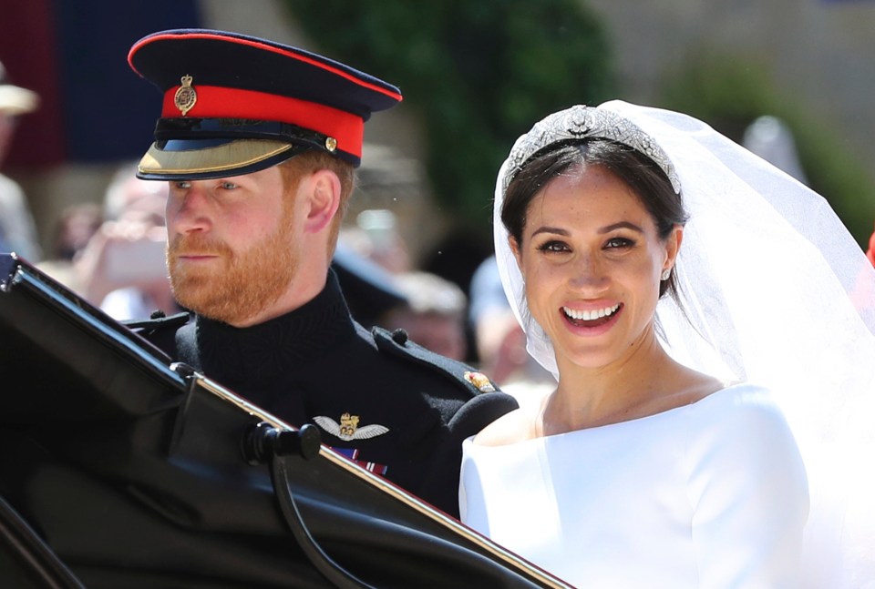  Prince Harry and Meghan Markle leave after their wedding ceremony in May 2018