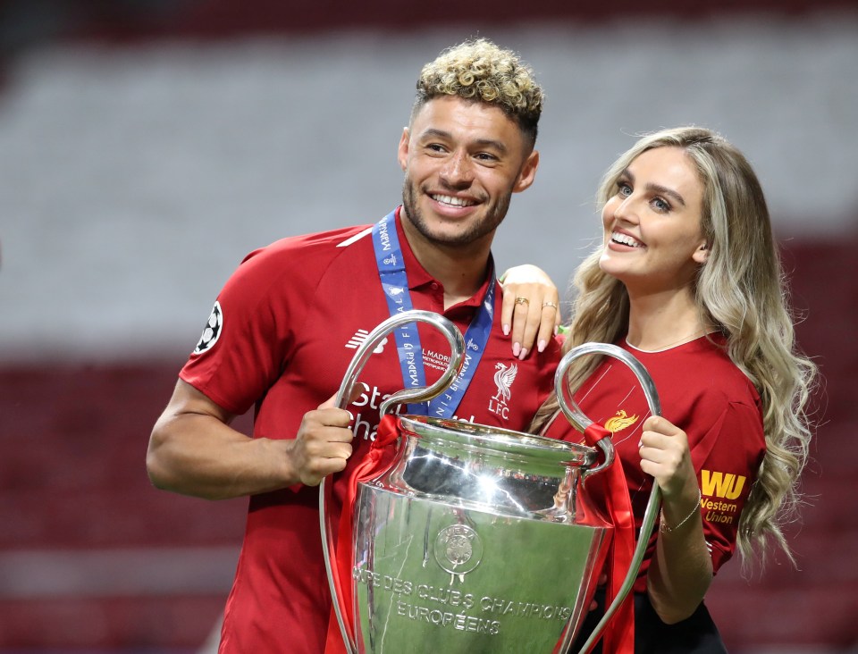  Perrie beamed with pride and lifted the cup with her man last Saturday