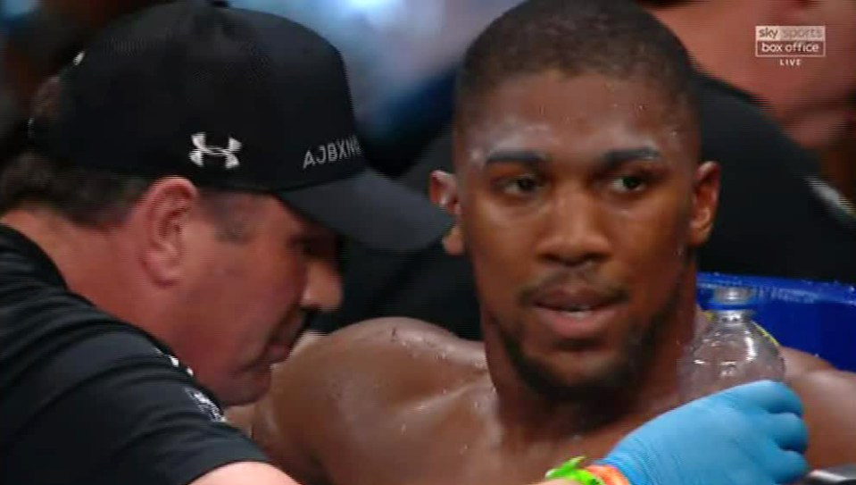  A dazed Anthony Joshua asks his corner man 'why am I feeling like this?' at the end of round six