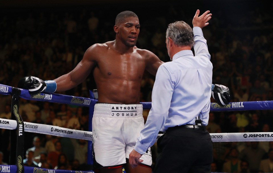 Referee Mike Griffin waves off the fight as Anthony Joshua loses for the first time in his pro career